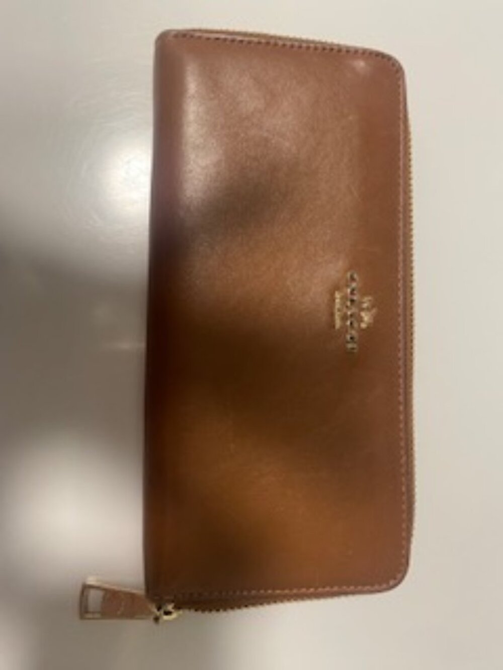 Coach slim accordion zip wallet.